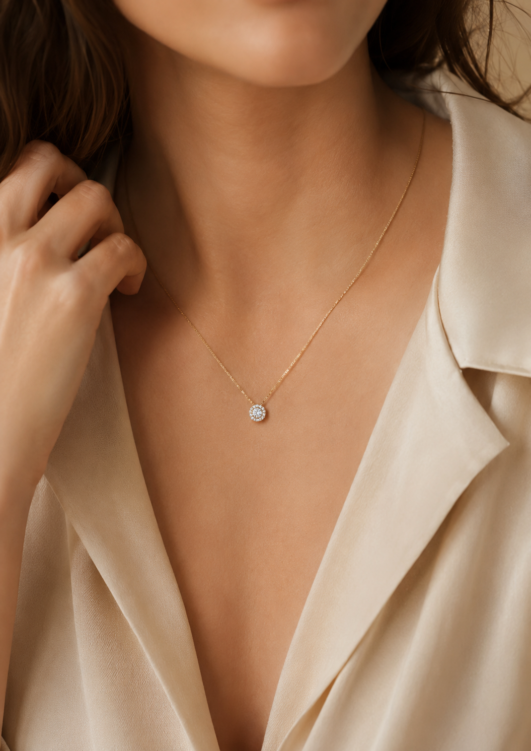 Woman wearing a delicate moissanite pendant necklace as a romantic gift