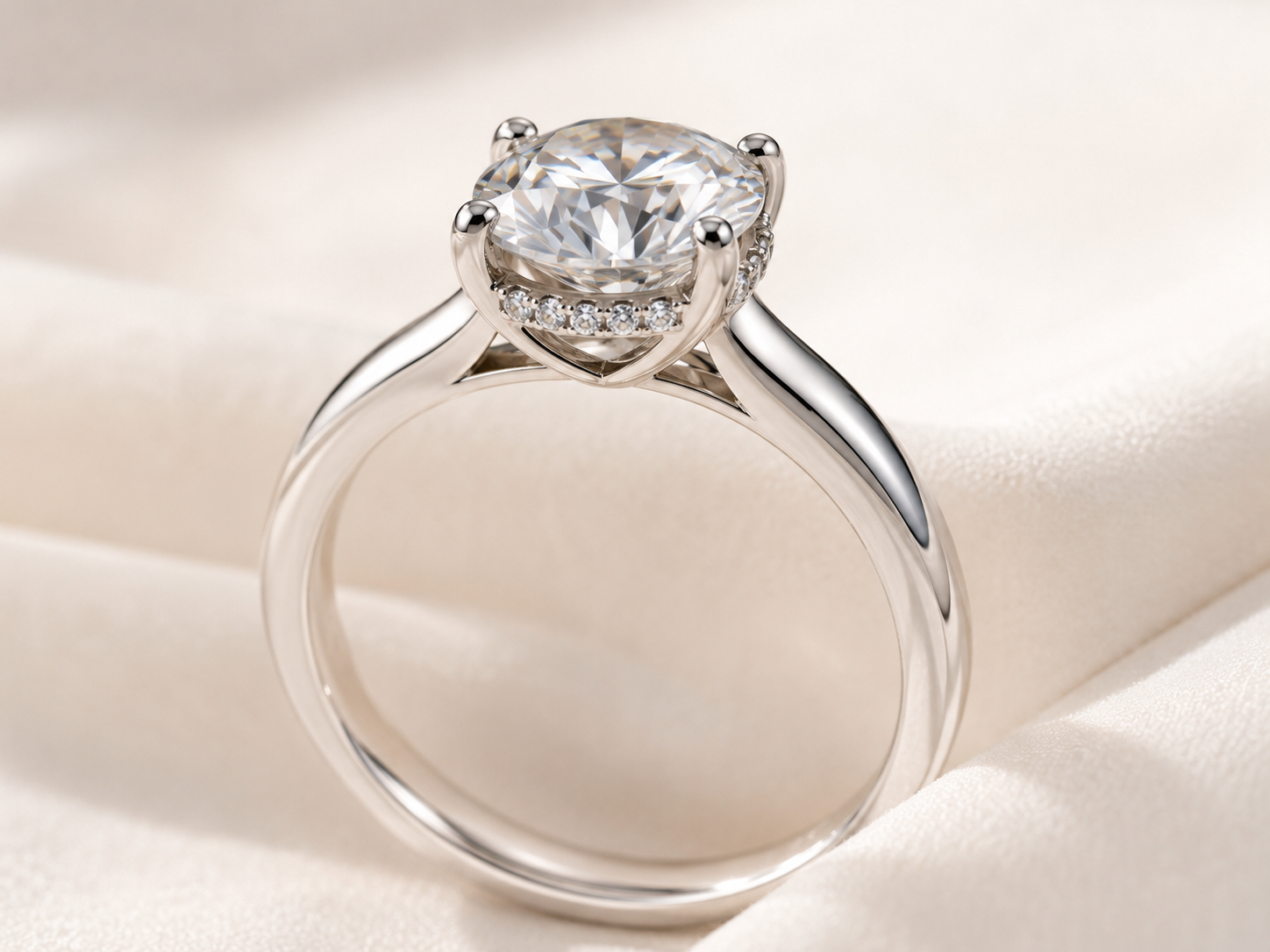 Side view of a moissanite ring showing a hidden halo beneath the center stone