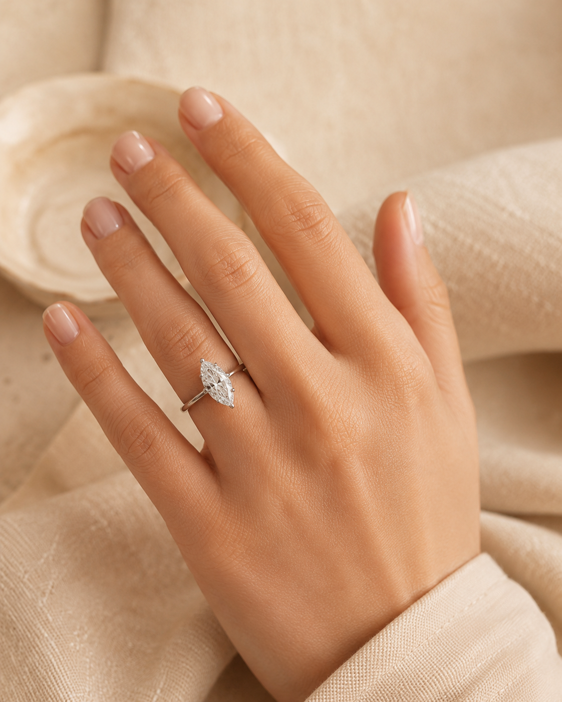 Marquise moissanite ring creating an elongated appearance on the finger