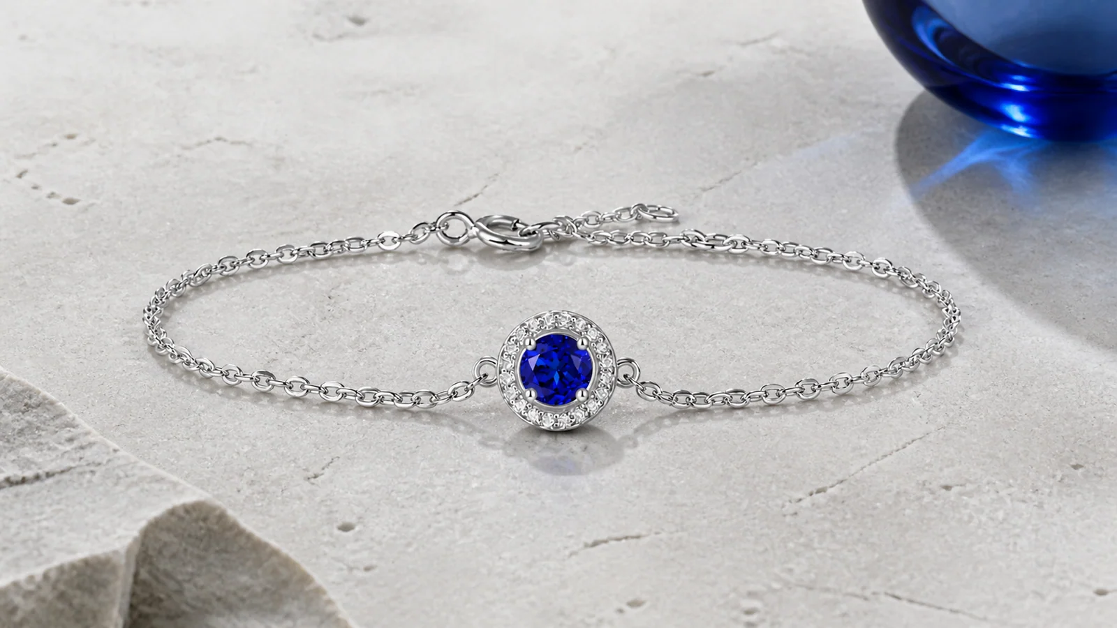 Azure Round-Cut S925 Sterling Silver Bracelet with a blue round center and halo