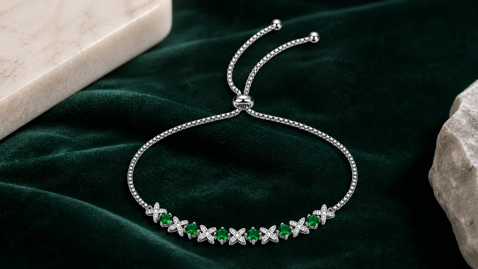 Near and Dear Clover S925 Sterling Silver Bracelet with green round centers, four-petal motifs and adjustable slider