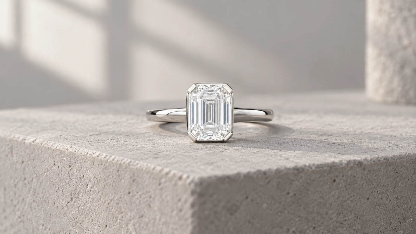 Emerald-cut solitaire ring showing focused sparkle