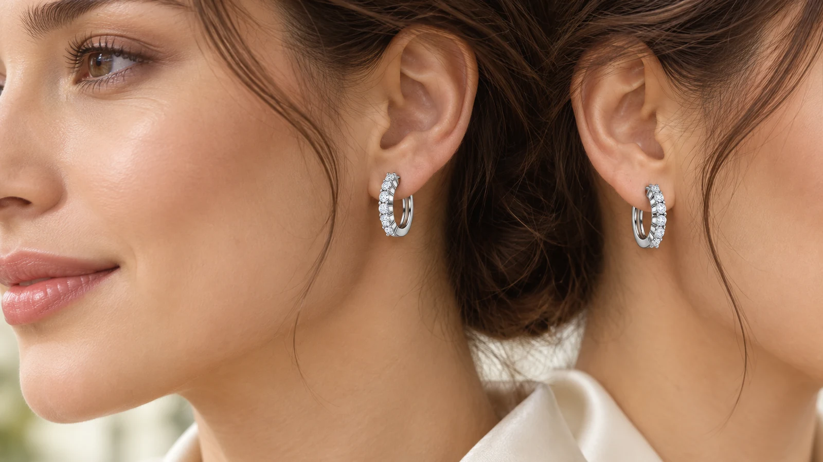Round pavé huggie hoop earrings worn beside the face