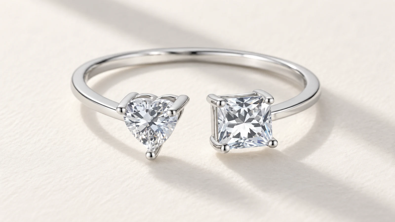 Heart and princess bypass ring showing open asymmetric contrast