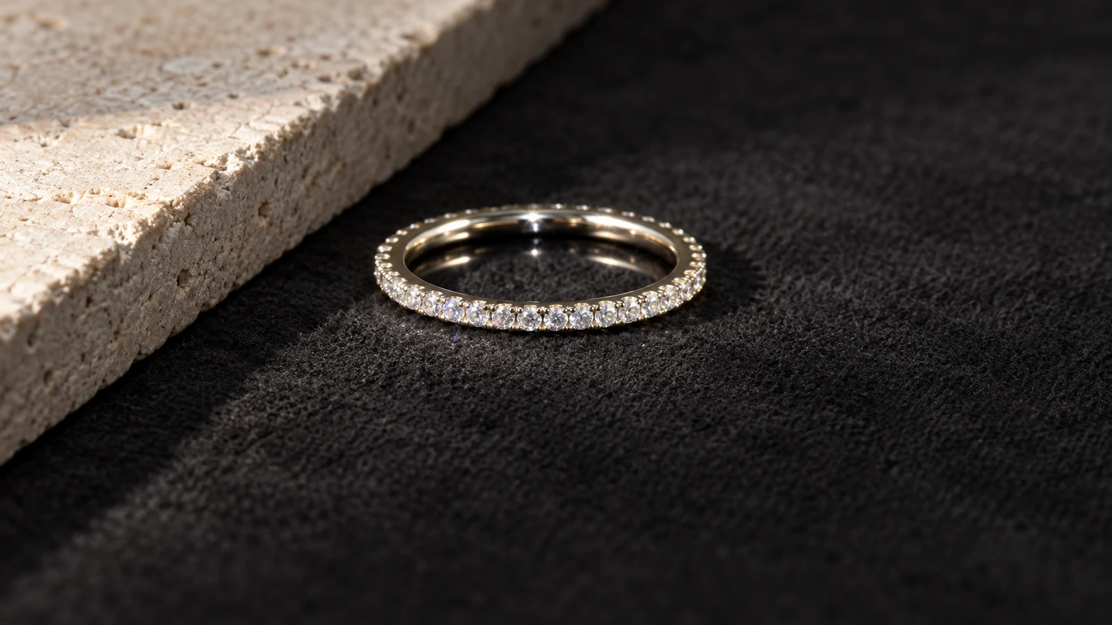 White moissanite pave eternity band showing continuous sparkle